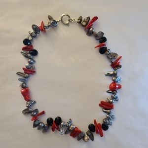 Black, silver, and red necklace